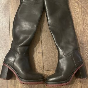 Black knee high heeled boots. Real leather.